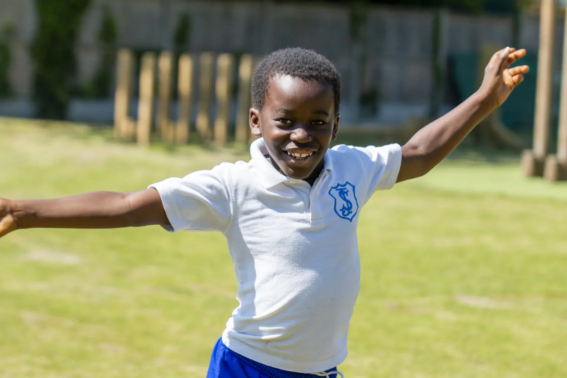 Primary school pupils playing sport captured for school branding photography